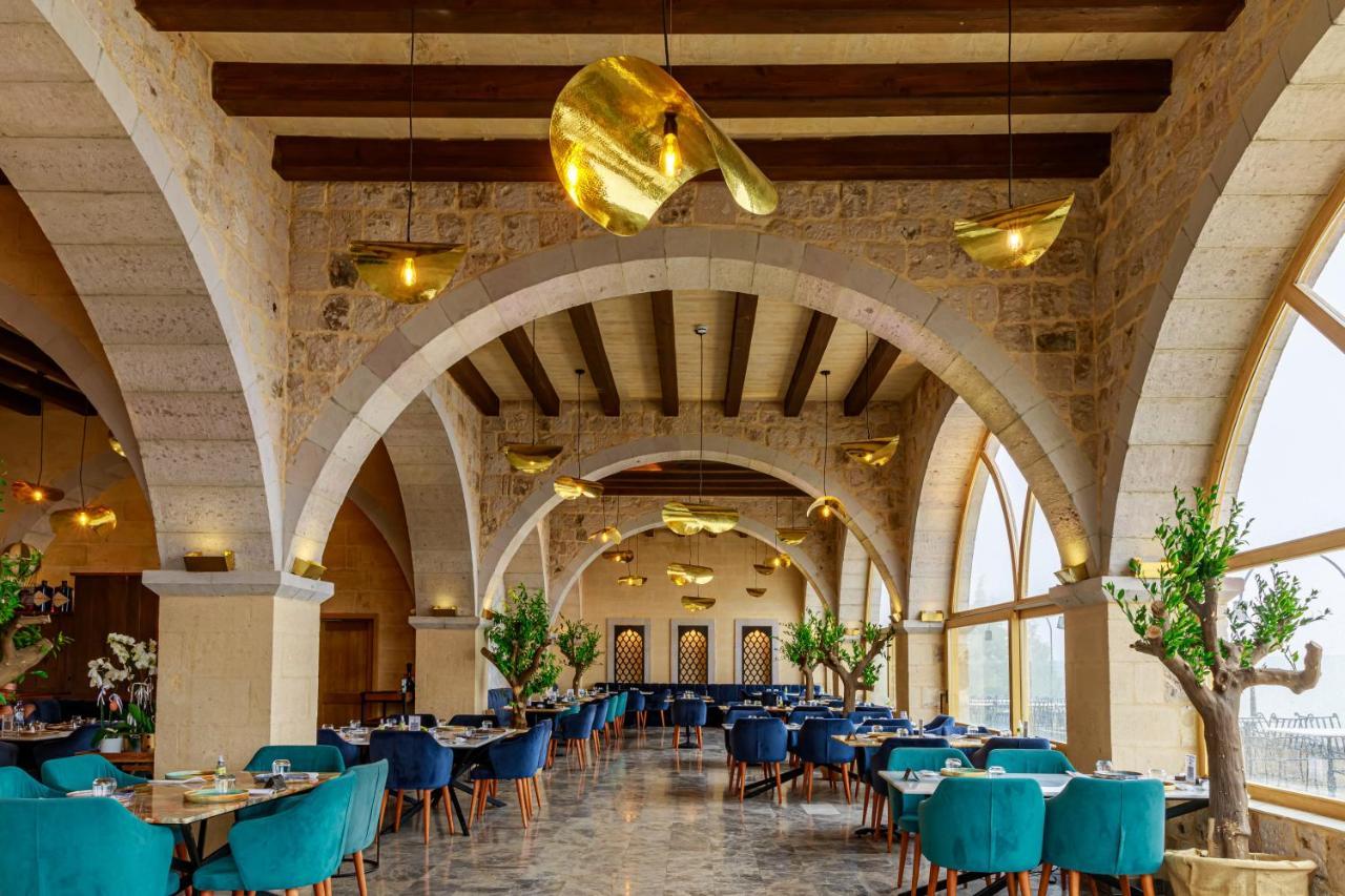 Millstone Cave Suites Hotel Uchisar Exterior photo