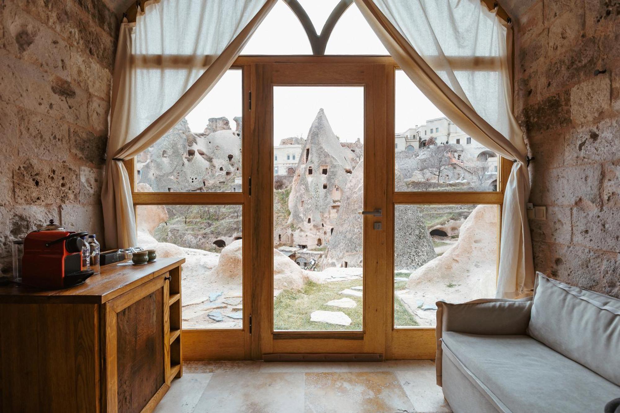 Millstone Cave Suites Hotel Uchisar Exterior photo