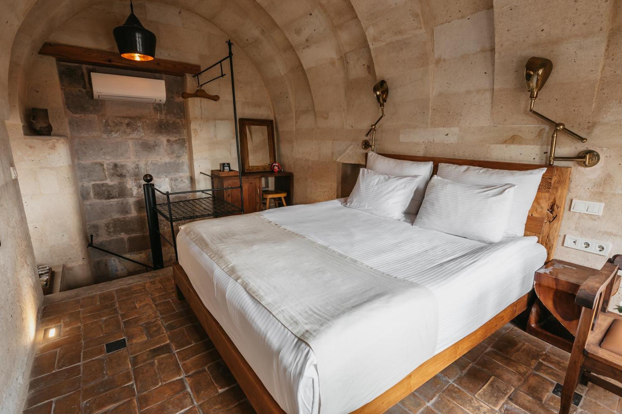 Millstone Cave Suites Hotel Uchisar Exterior photo