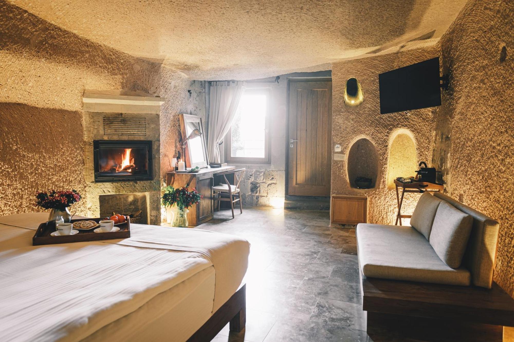 Millstone Cave Suites Hotel Uchisar Exterior photo
