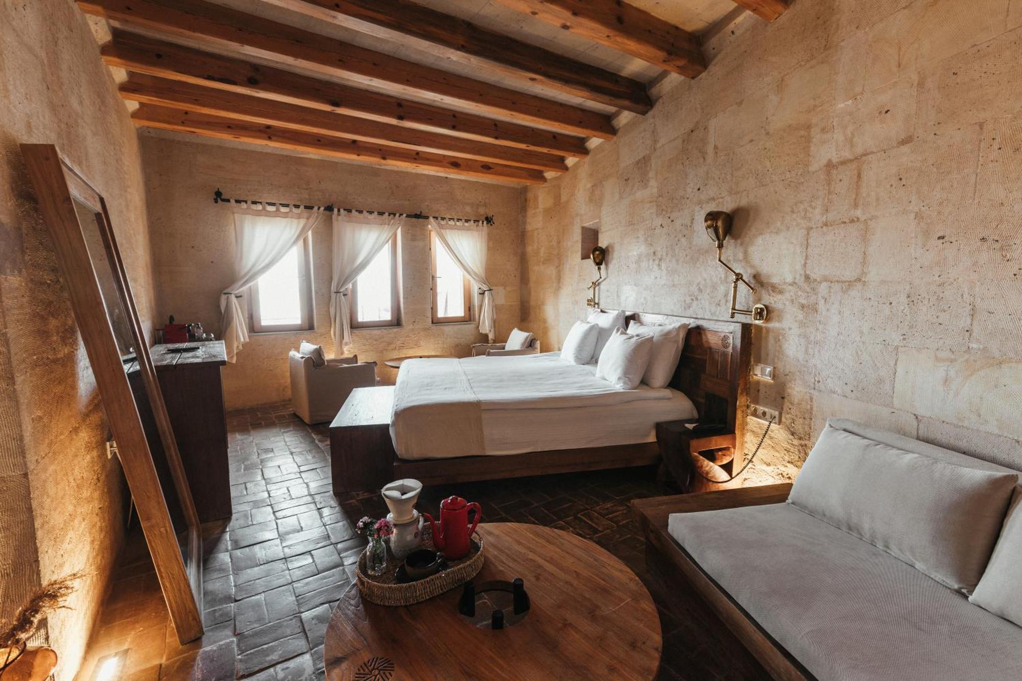 Millstone Cave Suites Hotel Uchisar Exterior photo